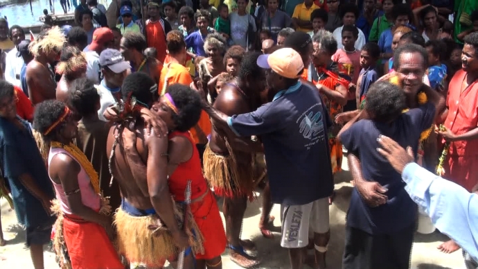 Pere villagers happy to see the Climate Challenger crew return home safely. (photo: still taken from video)